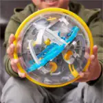 Balle de jeu éducative avec composants mécaniques et colorés, idéale pour stimuler la curiosité scientifique des enfants. Parfaite pour découvrir la mécanique et l'ingéniosité à travers le j.
