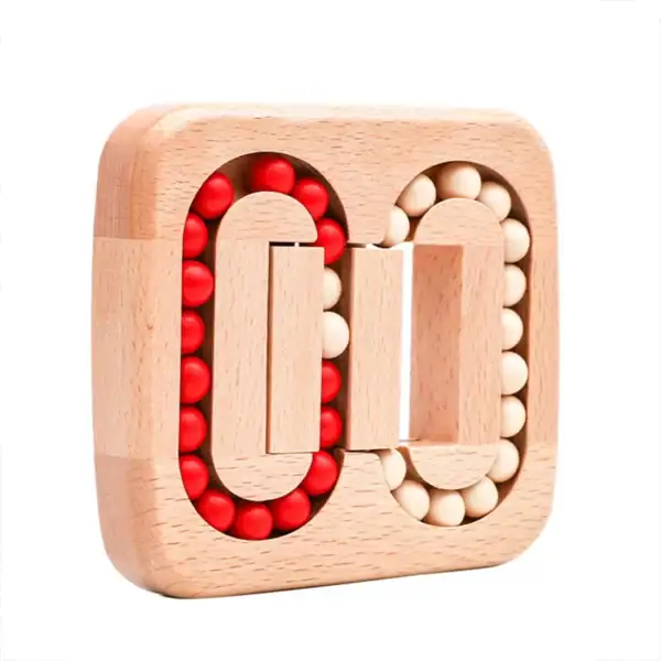 Pendulette en bois avec billes rouges et blanches, design éducatif et décoratif, idéale pour les amateurs de science et de décoration intérieure.