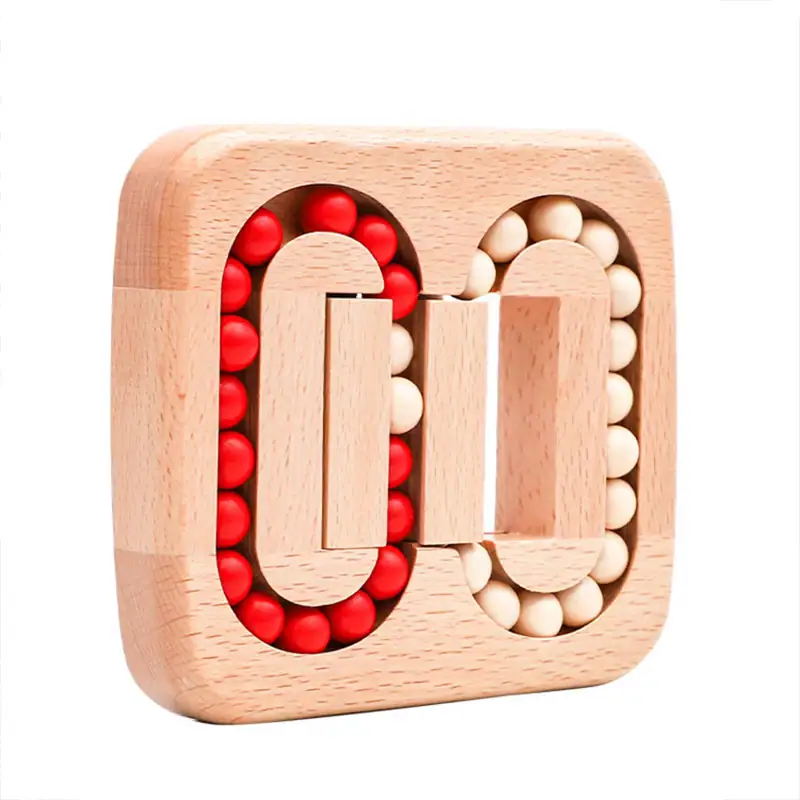 Pendulette en bois avec billes rouges et blanches, design éducatif et décoratif, idéale pour les amateurs de science et de décoration intérieure.