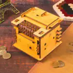 Coffre-fort mécanique en bois avec mécanisme à engrenages, idéal pour les amateurs de puzzles et de décoration scientifique. Parfait pour stimuler l'esprit et décorer un espace thématique.