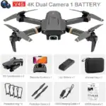 Drone quadricoptère 4K avec batterie, télécommande, accessoires et sac de rangement pour prises de vue aériennes et loisirs.