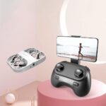 Drone de loisir avec caméra intégrée et télécommande pour capturer des images et vidéos aériennes, idéal pour les amateurs de photographie et de drone.
