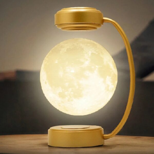 Lampe lune décorative avec support doré, créant une ambiance chaleureuse et mystérieuse dans votre intérieur. Idéale pour une décoration originale et élégante, inspirée de l'astronomie et de la scienc.