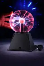 Lampe plasma tactile de 25 cm avec effets lumineux interactifs. Idéale pour la décoration scientifique et moderne, cette lampe crée des effets visuels impressionnants grâce à ses décharges électriques.