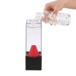 Distributeur d'eau avec bouteille en plastique et générateur de vapeur, idéal pour expériences scientifiques ou décoration éducative.