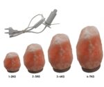 Poids de sel en forme de pierres pour pesée, allant de 1 à 7 kg, utilisé pour des expériences scientifiques ou des démonstrations éducatives.