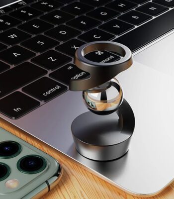 Accessoire technologique en forme de loupe pour smartphone et ordinateur, idéal pour la science et la technologie.