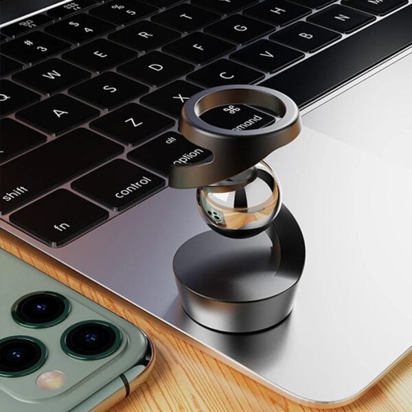 Accessoire technologique en forme de loupe pour smartphone et ordinateur, idéal pour la science et la technologie.