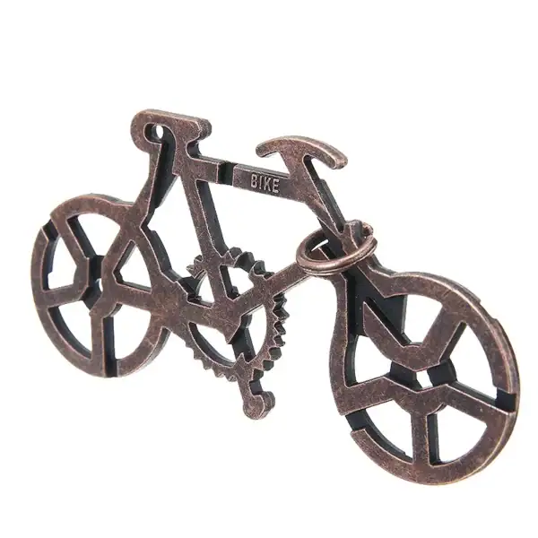 Porte-clé ou objet de décoration en forme de vélo en métal, idéal pour les amateurs de science et de design industriel.