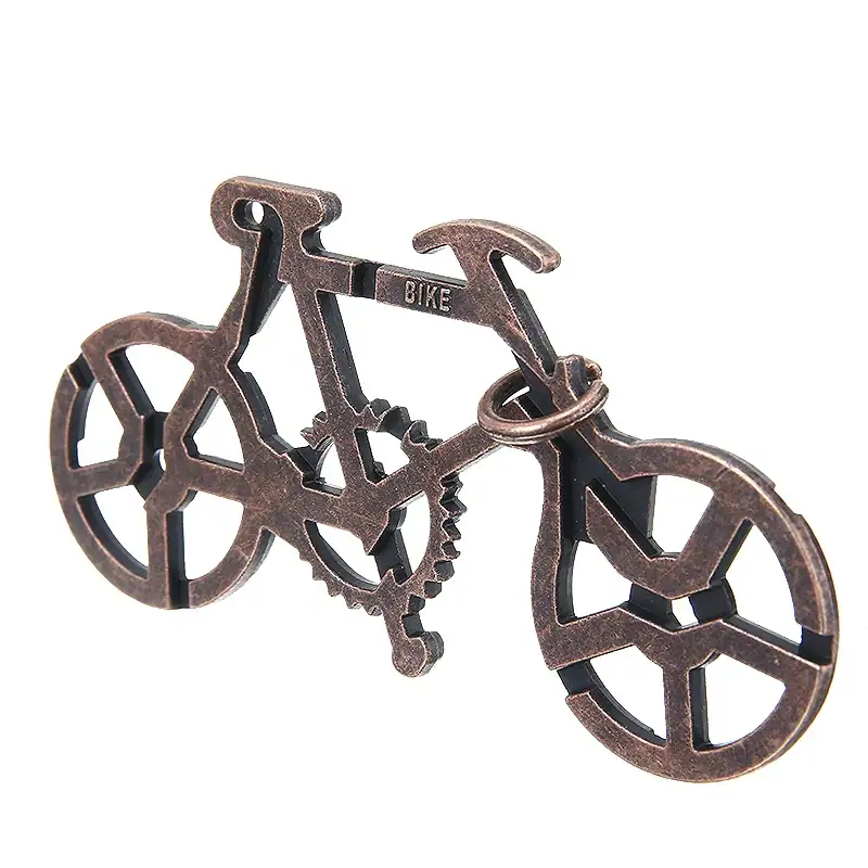 Porte-clé ou objet de décoration en forme de vélo en métal, idéal pour les amateurs de science et de design industriel.