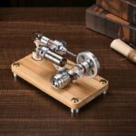 Mini moteur électrique en bois et métal, parfait pour expériences scientifiques et projets éducatifs, avec composants en acier et fil électrique.