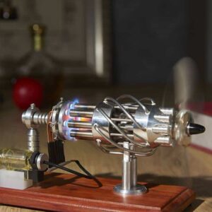 Modèle de réacteur scientifique avec tubes en verre et composants métalliques, illustrant une expérience de laboratoire en physique ou chimie.
