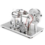 Modèle de machine scientifique en métal avec composants en verre et engrenages, illustrant un dispositif de laboratoire ou une expérience scientifique.
