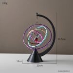 Mobile lumineux en spirale avec LED colorées, suspendu à un support noir, idéal pour décoration scientifique ou moderne.