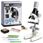 Microscope scientifique pour l'observation de petits objets, idéal pour l'apprentissage et la découverte, avec accessoires inclus pour expérimentations variées.