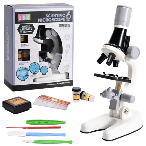 Microscope scientifique pour l'observation de petits objets, idéal pour l'apprentissage et la découverte, avec accessoires inclus pour expérimentations variées.