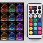 Vase lumineux avec LED multicolores contrôlées par télécommande, créant une ambiance colorée et moderne. Parfait pour la décoration intérieure ou comme objet scientifique lumineux.