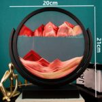 Modèle géologique en 3D représentant des montagnes colorées dans un cadre circulaire noir, idéal pour la décoration scientifique et éducative.