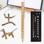 Pince à épiler de précision en métal doré, idéale pour la manipulation d'objets scientifiques ou de bijoux, avec un design élégant et ergonomique.