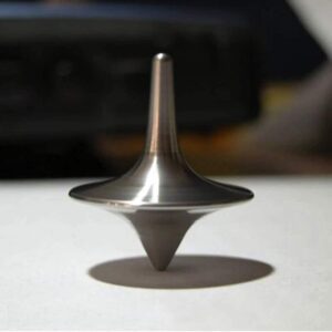 Toupie en métal inoxydable, objet de décoration scientifique, illustrant la physique et la dynamique. Parfaite pour une décoration moderne ou un collectionneur d'objets scientifiques.