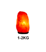 Lampe de sel Himalaya en forme de pierre, idéale pour la décoration intérieure et la purification de l'air, pesant entre 1 et 2 kg.