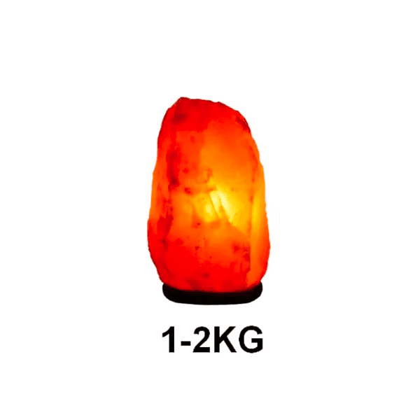 Lampe de sel Himalaya en forme de pierre, idéale pour la décoration intérieure et la purification de l'air, pesant entre 1 et 2 kg.
