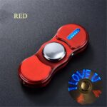 Spinner antistress rouge avec LED bleue intégrée, idéal pour la détente et la concentration. Design ergonomique et léger, parfait pour les activités relaxantes ou comme décoration de bureau.