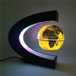 Porte-objet décoratif en forme de globe terrestre lumineux avec éclairage LED, idéal pour la décoration scientifique ou éducative.