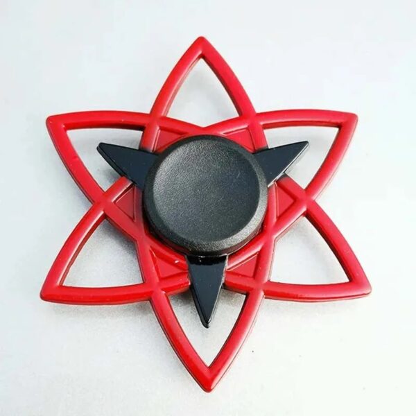 Porte-épice en forme d'atome avec structure en plastique rouge et noir, idéal pour la décoration de cuisine ou comme objet de collection scientifique.