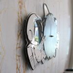 Horloge murale originale avec design de lunettes et montre, idéale pour les amateurs de science et de décoration moderne.