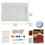 Ensemble pour expérience scientifique de volcan en éruption, comprenant un plateau, poudre volcanique, colorants, pinceaux, et accessoires pour simulation.