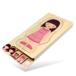 Puzzle en bois avec pièce à insérer représentant une jeune fille en robe rose, idéal pour l'apprentissage et le développement cognitif des enfants.
