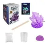 Cristal de vapeur DIY avec kit complet pour créer des cristaux violets impressionnants, comprenant un récipient, un bâton de mélange, un sachet de poudre, et un support pour cristaux.