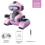 Robot éducatif rose pour enfants avec télécommande, manuel d'instructions et tournevis pour assembler ce robot interactif et éducatif, idéal pour stimuler la curiosité scientifique des jeunes.