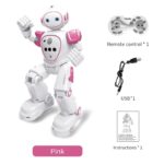 Robot éducatif pour enfants avec télécommande, câble USB et instructions, en couleur rose.