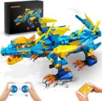 Tyrannosaure en briques LEGO colorées, équipé d'une télécommande et d'un éclairage, présenté sur un fond blanc avec un fond noir illustrant la boîte du produit.