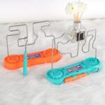 Jeu éducatif de pêche magnétique avec deux cannes et poissons en métal colorés, idéal pour développer la coordination et la concentration des enfants.
