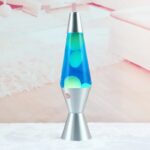 Lampe de décoration en forme de vase à lave avec effets lumineux colorés, idéale pour une décoration moderne et originale.