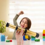 Telescope pour enfants en plastique avec lentille, idéal pour découvrir le ciel et les étoiles, parfait pour stimuler la curiosité scientifique des jeunes explorateurs.