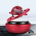 Objet scientifique en verre avec anneaux orbitaux, décoration de style futuriste pour les amateurs de science et d'objets décoratifs innovants.