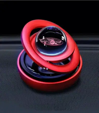 Modèle de boule à illusion optique avec spirale rouge, illustrant un objet scientifique décoratif et intrigant, parfait pour une décoration de style scientifique ou moderne.