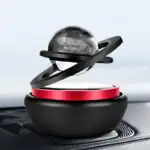 Modèle de sphère scientifique avec anneaux orbitaux en plastique noir et rouge, illustrant un concept de planétarium ou d'astronomie.
