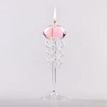 Bougie en verre avec flamme, décoration scientifique élégante pour intérieur.