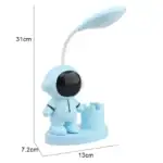 Lampe de lecture en forme d'astronaute avec vaisseau spatial, décoration originale pour chambre d'enfant ou bureau, éclairage LED doux, design ludique et moderne.