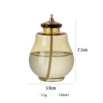 Porte-encens en verre transparent avec couvercle en bois, idéal pour diffuser des parfums ou des huiles essentielles dans votre espace.