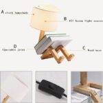 Lampe de lecture en bois avec abat-jour en tissu, support réglable et source lumineuse E27, idéale pour la lecture ou la décoration intérieure.