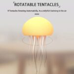 Poulpe en rotation automatique, inspiré d'une méduse, utilisé comme objet décoratif scientifique pour bureau ou intérieur.