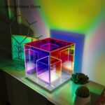 Vitrine en plexiglas transparent avec éclairage LED multicolore, idéale pour la décoration intérieure ou la présentation d'objets scientifiques.
