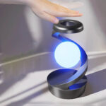Lampe décorative en forme de sphère lumineuse avec spirale métallique, idéale pour la décoration scientifique ou moderne.