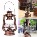 Lampe à pétrole vintage en cuivre avec verre transparent, idéale pour décoration intérieure ou extérieure.